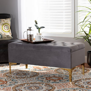 BAXTON STUDIO VALERE GLAM AND LUXE GREY VELVET FABRIC UPHOLSTERED GOLD FINISHED BUTTON TUFTED STORAGE OTTOMAN