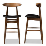 Load image into Gallery viewer, Baxton Studio Flora Mid-Century Modern Black Faux Leather Upholstered Walnut Finished Bar Stool (Set Of 2)
