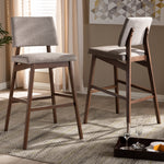 Load image into Gallery viewer, Baxton Studio Colton Mid-Century Modern Light Gray Fabric Upholstered And Walnut-Finished Wood Bar Stool Set Of 2
