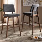 Load image into Gallery viewer, Baxton Studio Colton Mid-Century Modern Dark Gray Fabric Upholstered And Walnut-Finished Wood Bar Stool Set Of 2
