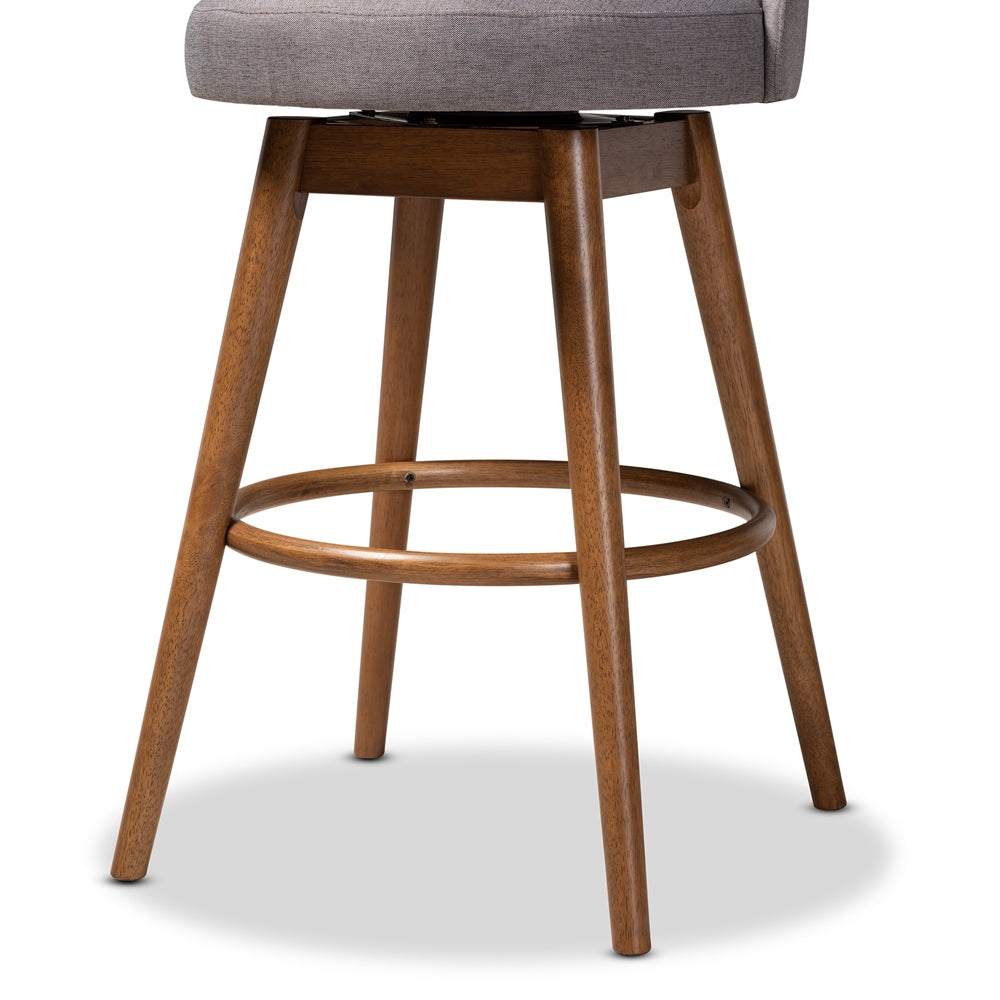 BAXTON STUDIO CARRA MID-CENTURY MODERN GREY FABRIC UPHOLSTERED WALNUT-FINISHED WOOD SWIVEL BAR STOOL (SET OF 2)