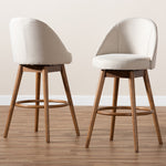 Load image into Gallery viewer, Baxton Studio Carra Mid-Century Modern Light Beige Fabric Upholstered Walnut-Finished Wood 2-Piece Swivel Bar Stool Set
